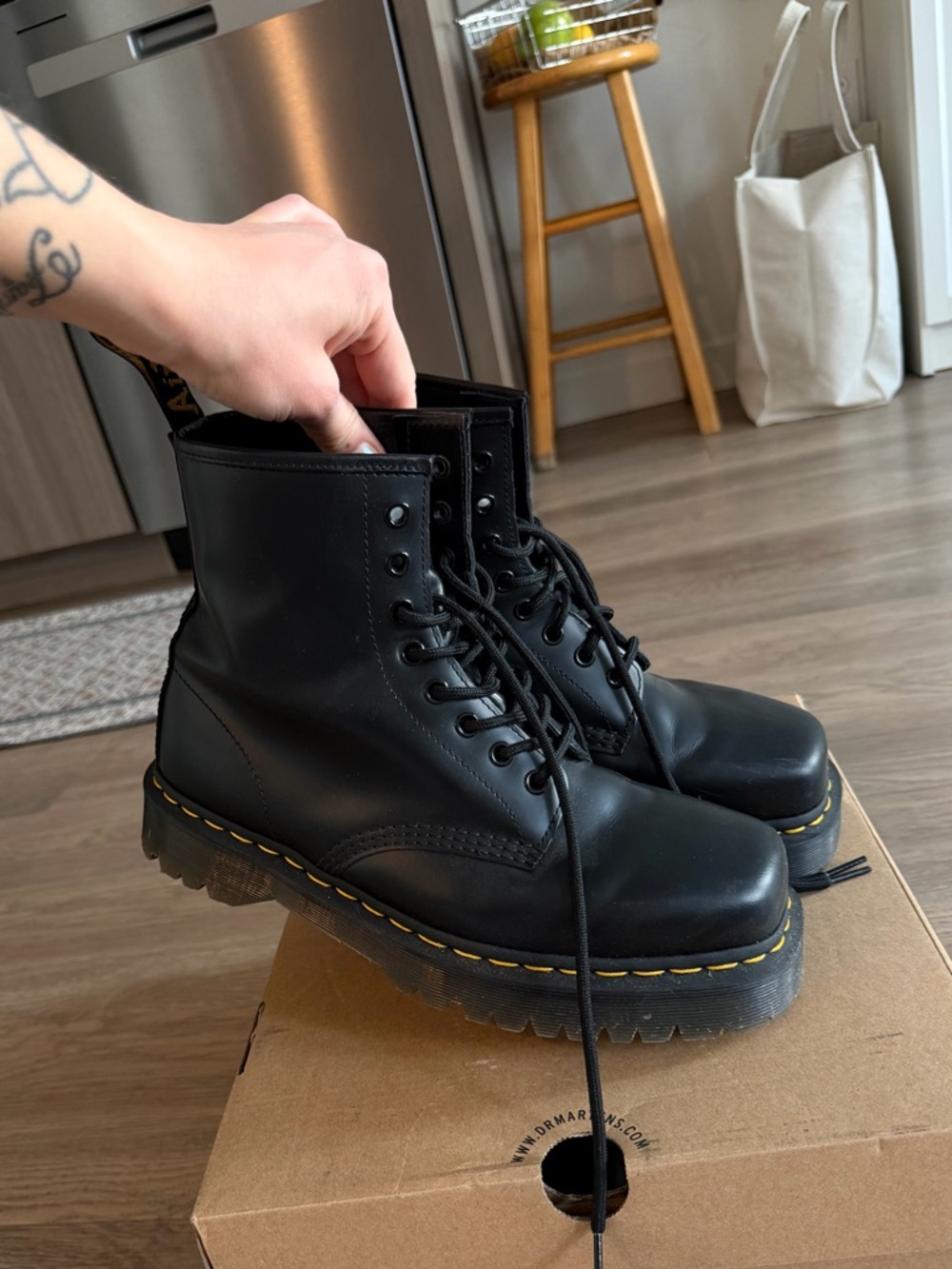 Dr. Martens Black Leather Lace-Up Platform Boots with Yellow Stitching